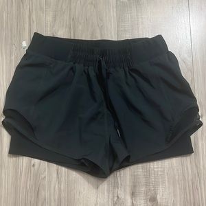 Sports shorts. Undershorts built in. Low waisted. Very comfy.